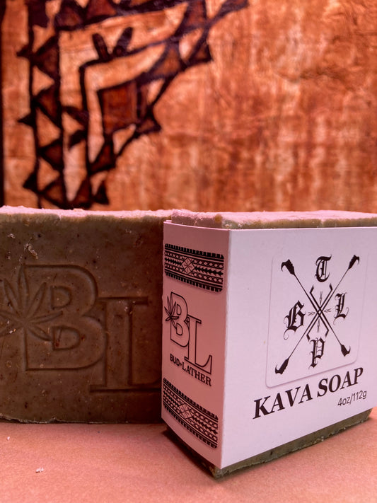 Kava soap bar with packaging featuring a brand logo on a wooden background