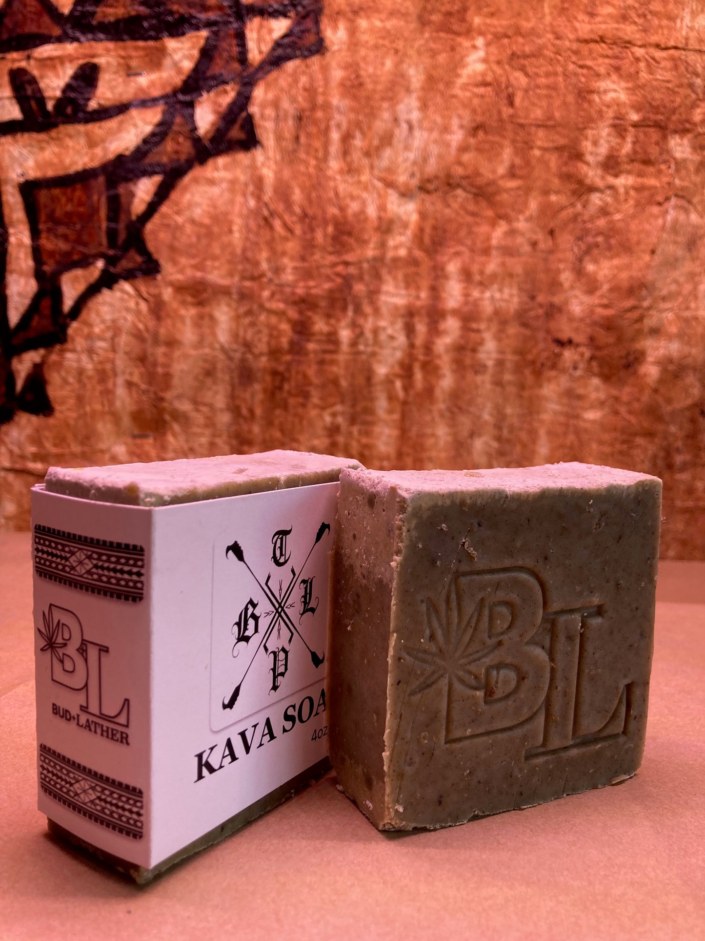 Bar of soap with packaging on a wooden surface