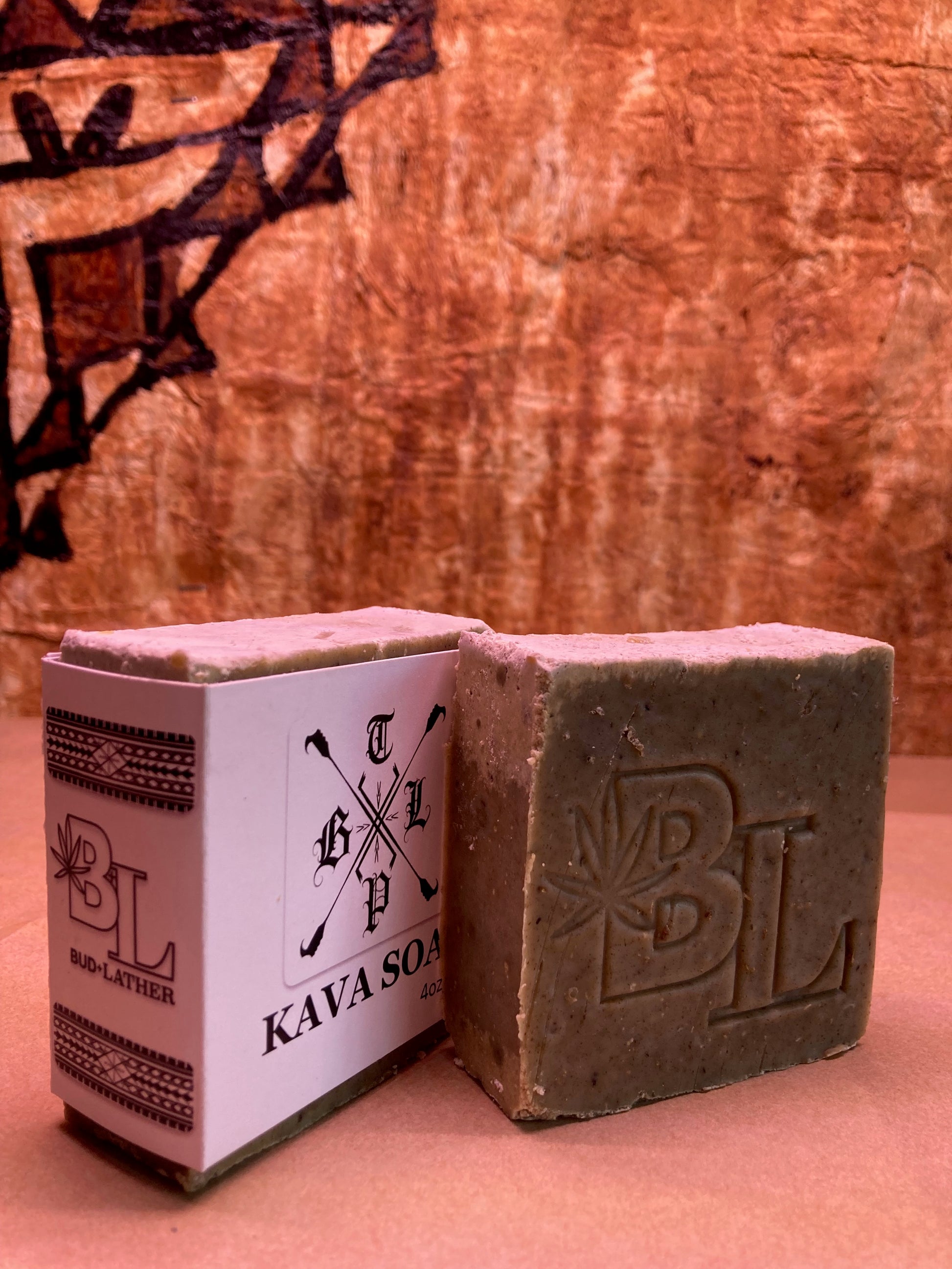Bar of soap with packaging on a wooden surface